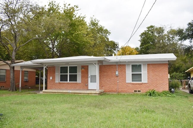 property at 1225 E 15th St