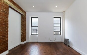 W. 124th St, St Nicholas Ave in New York, NY - Building Photo - Building Photo