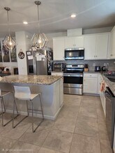 9687 Rally Spring Lp in Wesley Chapel, FL - Building Photo - Building Photo