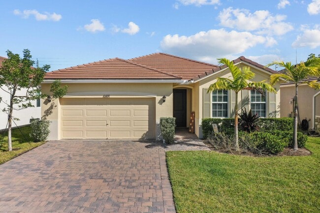 property at 4491 NW Oakleaf Ct