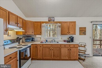 67 Tranquil Way in Great Cacapon, WV - Building Photo - Building Photo