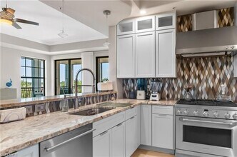 10733 Mirasol Dr-Unit -511 - A in Ft. Myers, FL - Building Photo - Building Photo