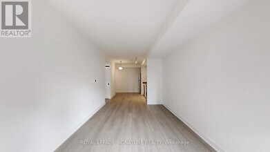 61 Charles St E in Toronto, ON - Building Photo - Building Photo