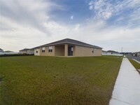 5859 SW 77th Ct in Ocala, FL - Foto de edificio - Building Photo