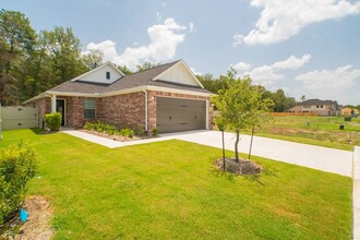 10696 Wild Chives, Unit A_519 in The Woodlands, TX - Building Photo - Building Photo