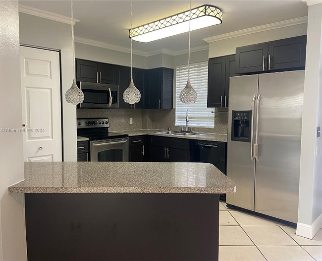 property at 6175 NW 186th St