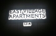 Property Management Company Logo East Village Apartments