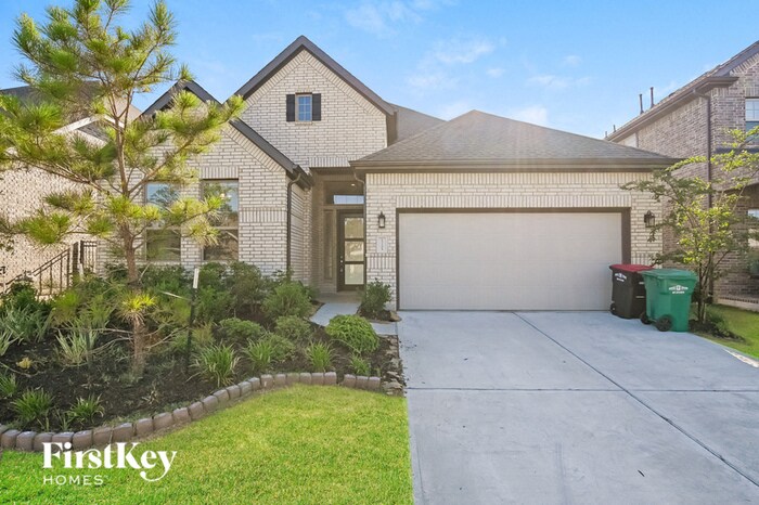27209 Polo Wind Ct in Magnolia, TX - Building Photo