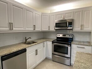 1116 11th Ln, Unit Garden lakes in Palm Beach Gardens, FL - Building Photo - Building Photo