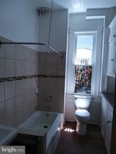2816 St Paul St, Unit 1902 in Baltimore, MD - Building Photo - Building Photo