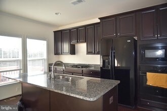 43313 Foyt Terrace, Unit 301 in Ashburn, VA - Building Photo - Building Photo