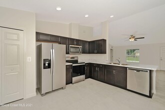 231 Mardi Gras Ave NW, Unit 2207 in Palm Bay, FL - Building Photo - Building Photo