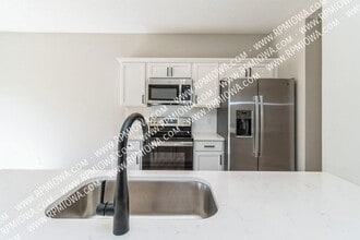 5695 Buckthorne Dr in Pleasant Hill, IA - Building Photo - Building Photo