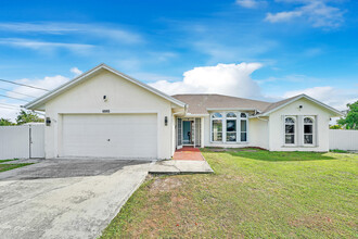 6993 NW Jorgensen Rd in Port St. Lucie, FL - Building Photo - Building Photo