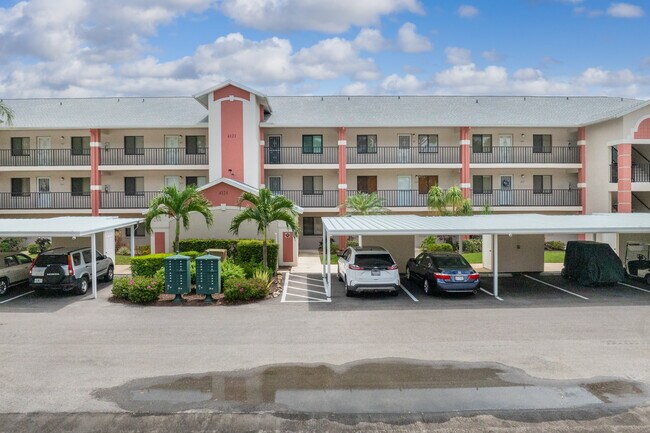 Village on Courtside Lake in Estero, FL - Building Photo - Building Photo