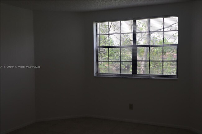 11225 W Atlantic Blvd in Coral Springs, FL - Building Photo - Building Photo