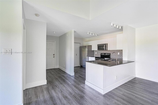 11233 W Atlantic Blvd, Unit #307 UPDATED in Coral Springs, FL - Foto de edificio - Building Photo