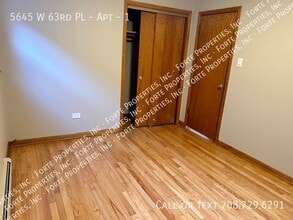 5645 W 63rd Pl-Unit -1 in Chicago, IL - Building Photo - Building Photo
