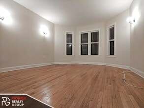 4036 N Ashland Ave, Unit E1 in Chicago, IL - Building Photo - Building Photo