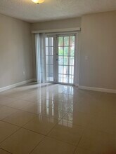 5001 Wiles Rd in Coconut Creek, FL - Building Photo - Building Photo