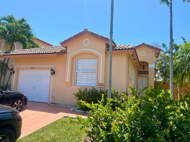 property at 8766 SW 213th Ter