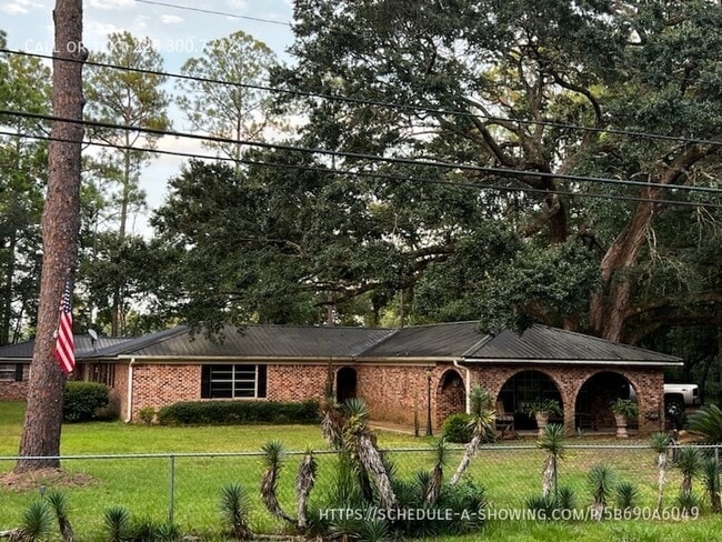 property at 9708 Forts Lake Rd