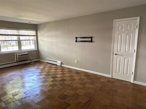 1102 Town House Village in Islandia, NY - Building Photo - Building Photo