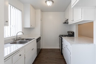 Village West Apartments in Riverside, CA - Building Photo