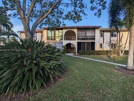 5801 Whispering Pine Way in Greenacres, FL - Building Photo