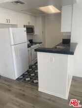 1242 S Holt Ave in Los Angeles, CA - Building Photo - Building Photo