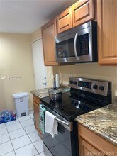 3301 Spanish Moss Terrace-Unit -416 in Lauderhill, FL - Foto de edificio - Building Photo