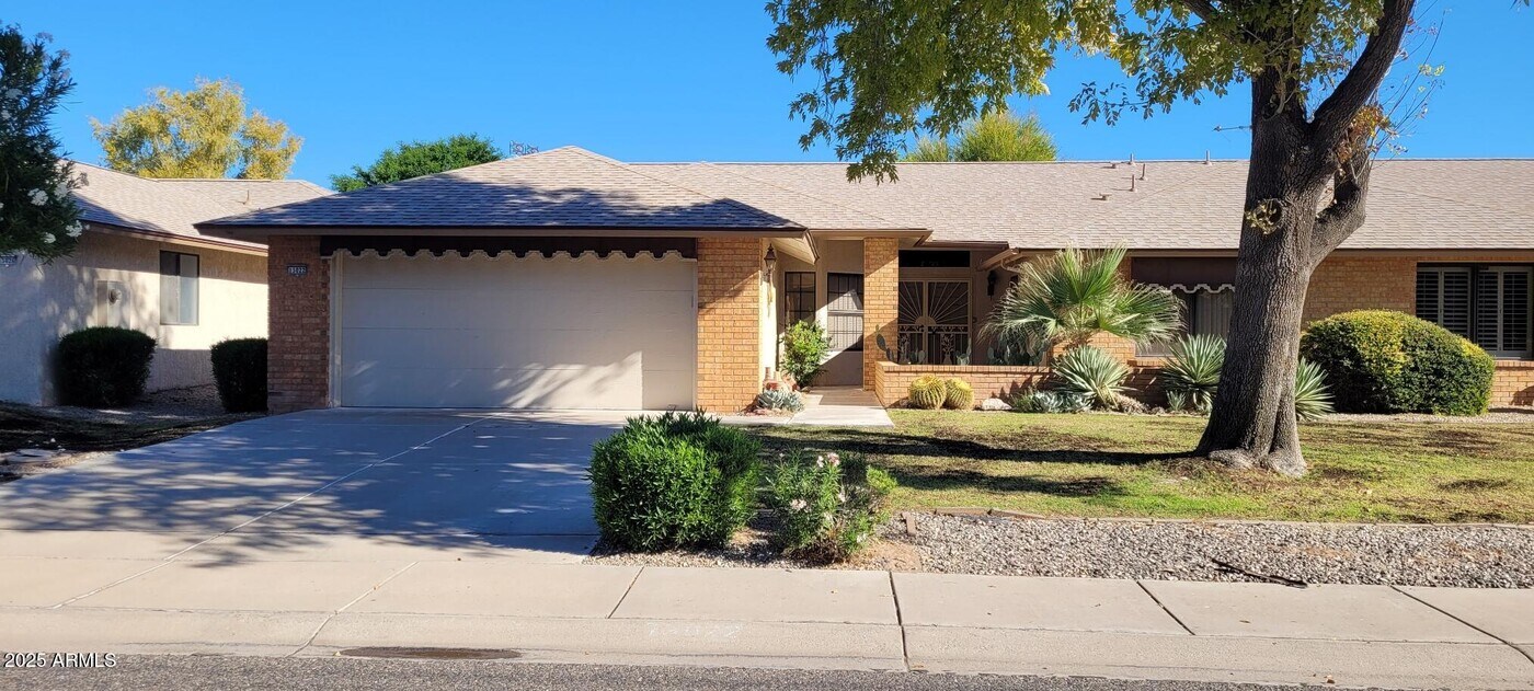 13022 W Peach Blossom Dr in Sun City West, AZ - Building Photo