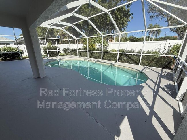 15570 Beach Pebble Way in Ft. Myers, FL - Foto de edificio - Building Photo