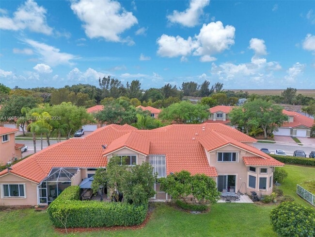 12675 NW 56th Dr in Coral Springs, FL - Building Photo - Building Photo