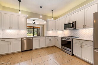 9472 River Otter Dr in Ft. Myers, FL - Building Photo - Building Photo