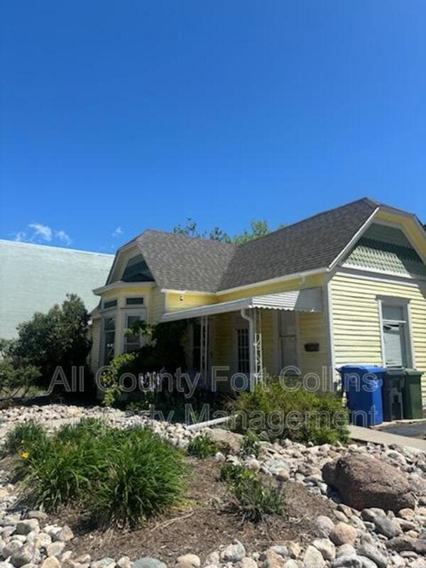 property at 403 E 3rd St