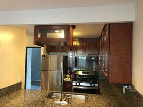 16872 Pacific Coast Hwy-Unit -102 in Huntington Beach, CA - Building Photo - Building Photo