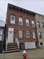 128 W 20th St in Bayonne, NJ - Building Photo