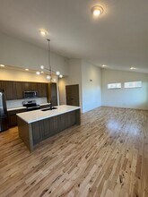 108-110 Amberwood Ct in Raymore, MO - Building Photo - Building Photo