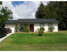 1050 SW Fenway Rd in Port St. Lucie, FL - Building Photo