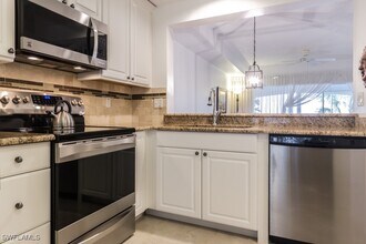 1044 Woodshire Ln in Naples, FL - Building Photo - Building Photo