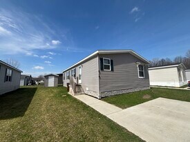 410 Laurel Oak Ln in Whittaker, MI - Building Photo