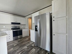 6591 Hidden Oaks Dr in North Fort Myers, FL - Building Photo - Building Photo