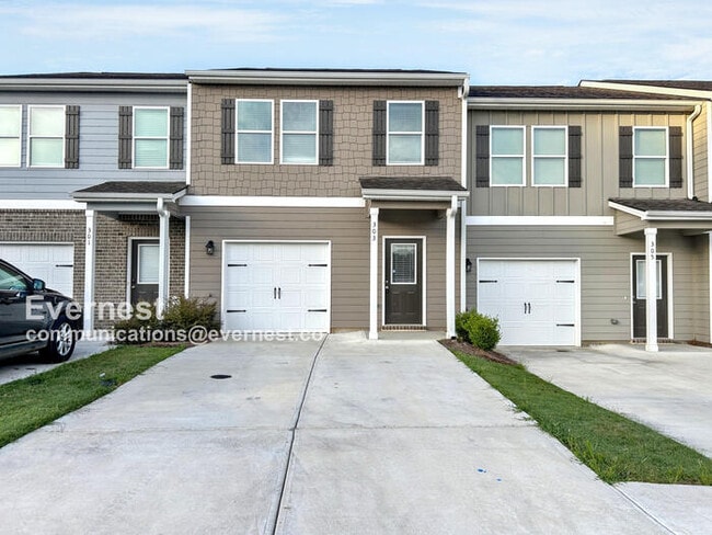 property at 303 Rolling Grn Dr NW