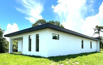 1218 Eclat St E in Lehigh Acres, FL - Building Photo - Building Photo
