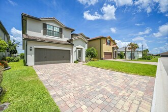 4995 Cavelletti Rd in Greenacres, FL - Building Photo - Building Photo