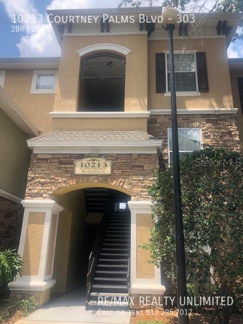 property at 10213 Courtney Palms Blvd