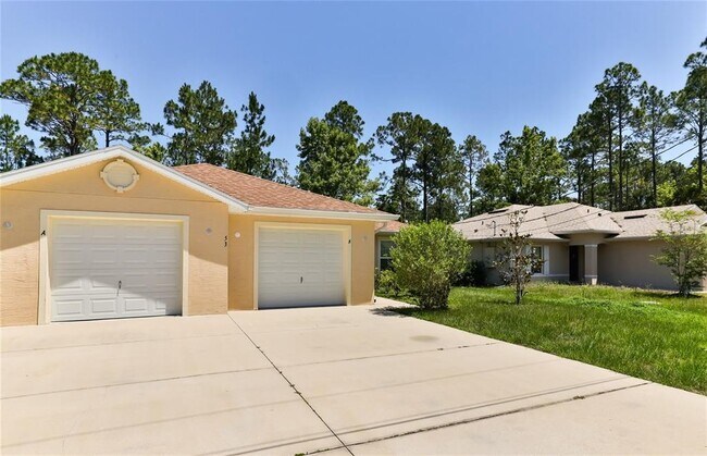 53 Pine Haven Dr in Palm Coast, FL - Foto de edificio - Building Photo
