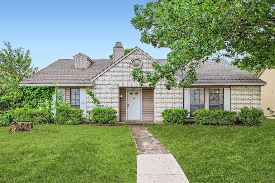 8314 Kensington Dr, Unit 14-105 in Rowlett, TX - Building Photo