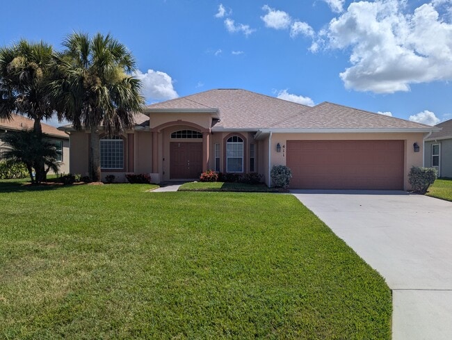 property at 411 SW Vista Lake Dr